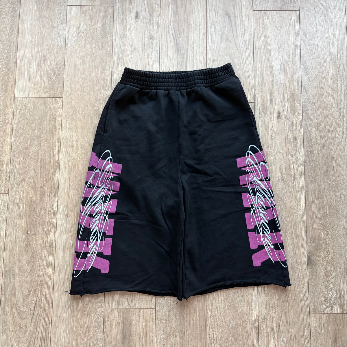 Pink “War” 3/4 Shorts